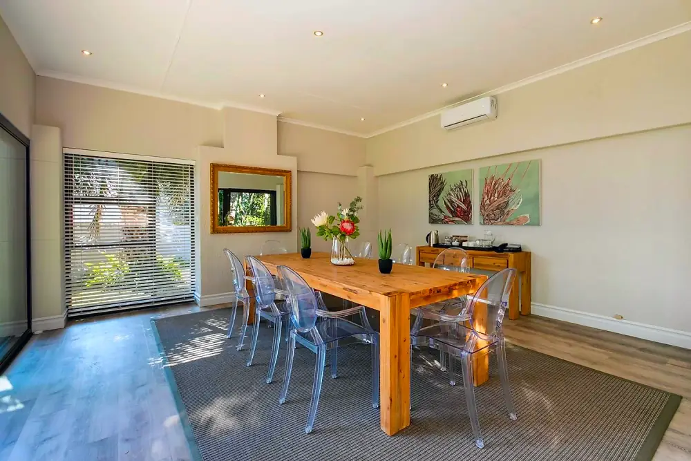 Bright breakaway meeting room with garden views at The Workplace, Lonehill