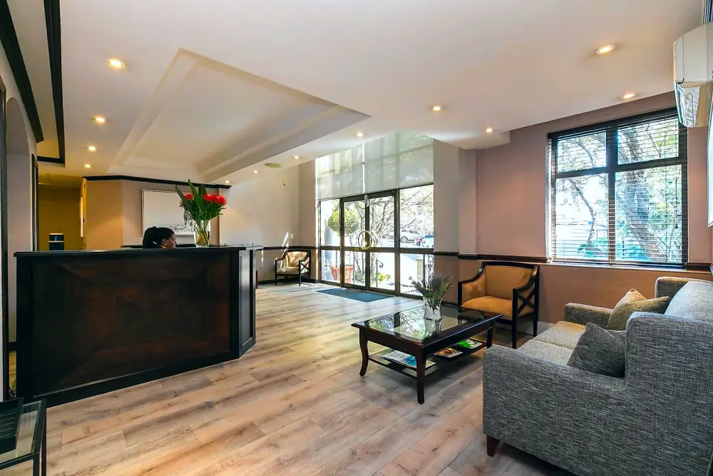 Reception seating and entrance at The Workplace, Lonehill, Sandton